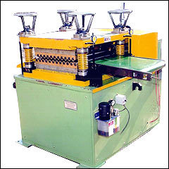 COMPONENT STRAIGHTENER MACHINE